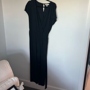 Black jumpsuit in large with tie at waist. Jersey comfy material